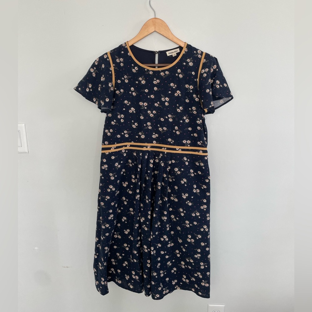 Navy and orange floral dress with flutter sleeves and pockets
